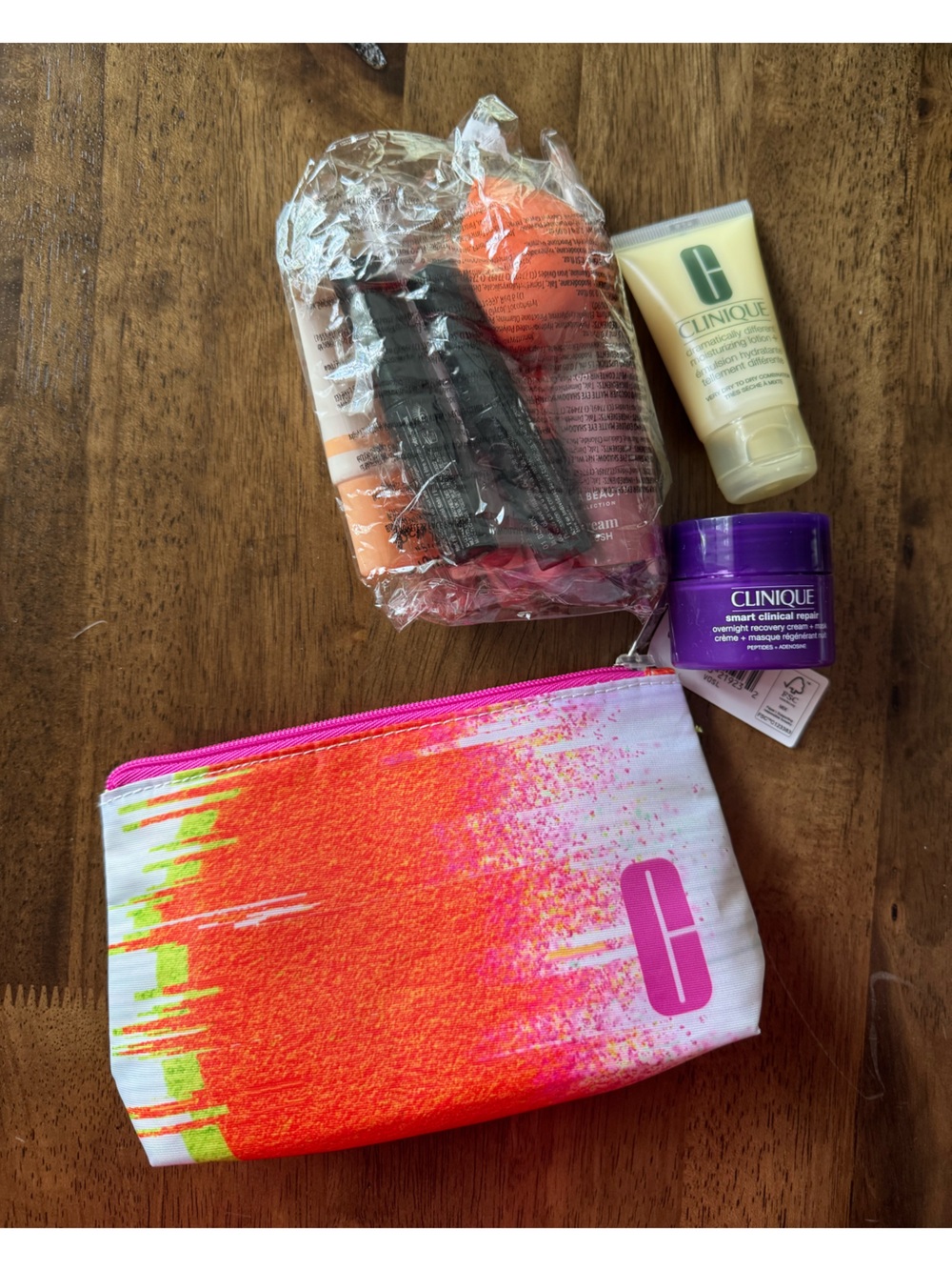 Clinique Face Gift Set with Orange/Pink Cosmetic Pouch and Ulta Make Up Sampler